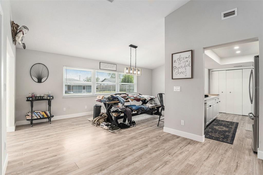 10234 Bedford Road Spring Hill, FL 34608 - Photo 8 of 31 a living room with furniture window and wooden floor