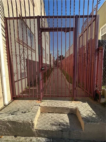 a view of stairs and wooden fence