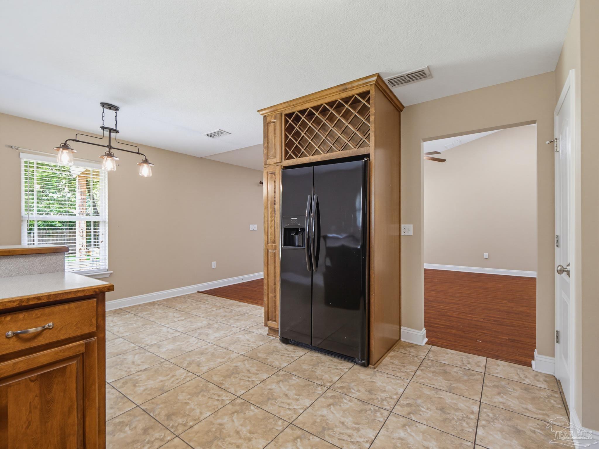 5567 Jones Street Milton, FL 32570 - Photo 19 of 48 a view of hallway with a mirror and a shower