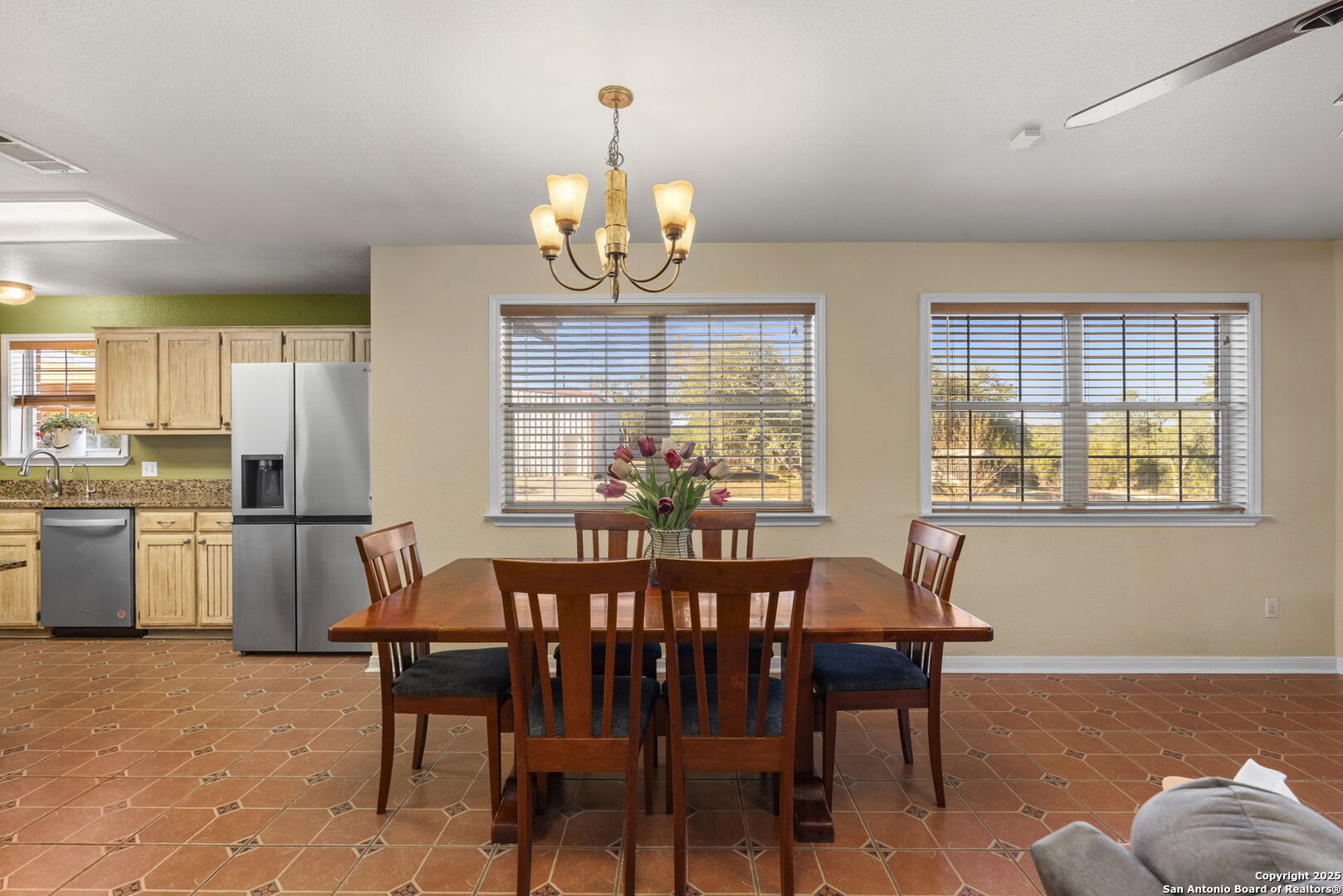 4335 Mail Rte Road Fischer, TX 78623 - Photo 15 of 50 a view of a dining room with furniture a chandelier and wooden floor