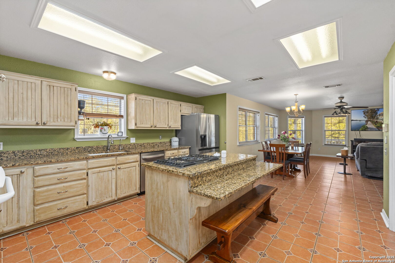 4335 Mail Rte Road Fischer, TX 78623 - Photo 16 of 50 a kitchen with stainless steel appliances granite countertop sink stove refrigerator and cabinets
