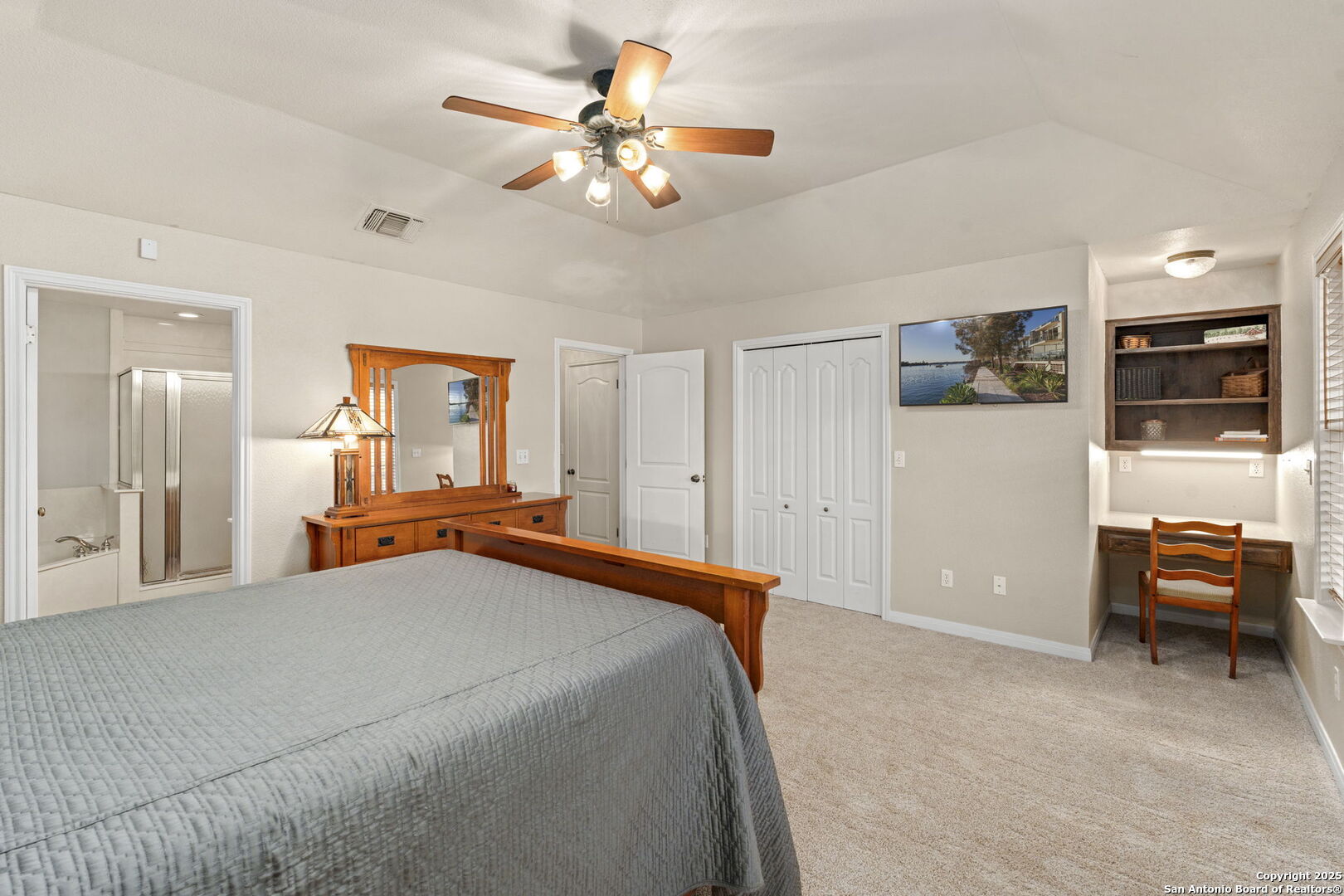 4335 Mail Rte Road Fischer, TX 78623 - Photo 22 of 50 a bedroom with a bed and a chandelier