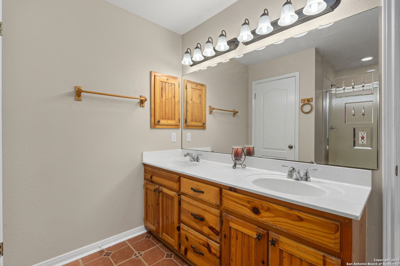 4335 Mail Rte Road Fischer, TX 78623 - Photo 24 of 50 a bathroom with a sink double vanity and a mirror