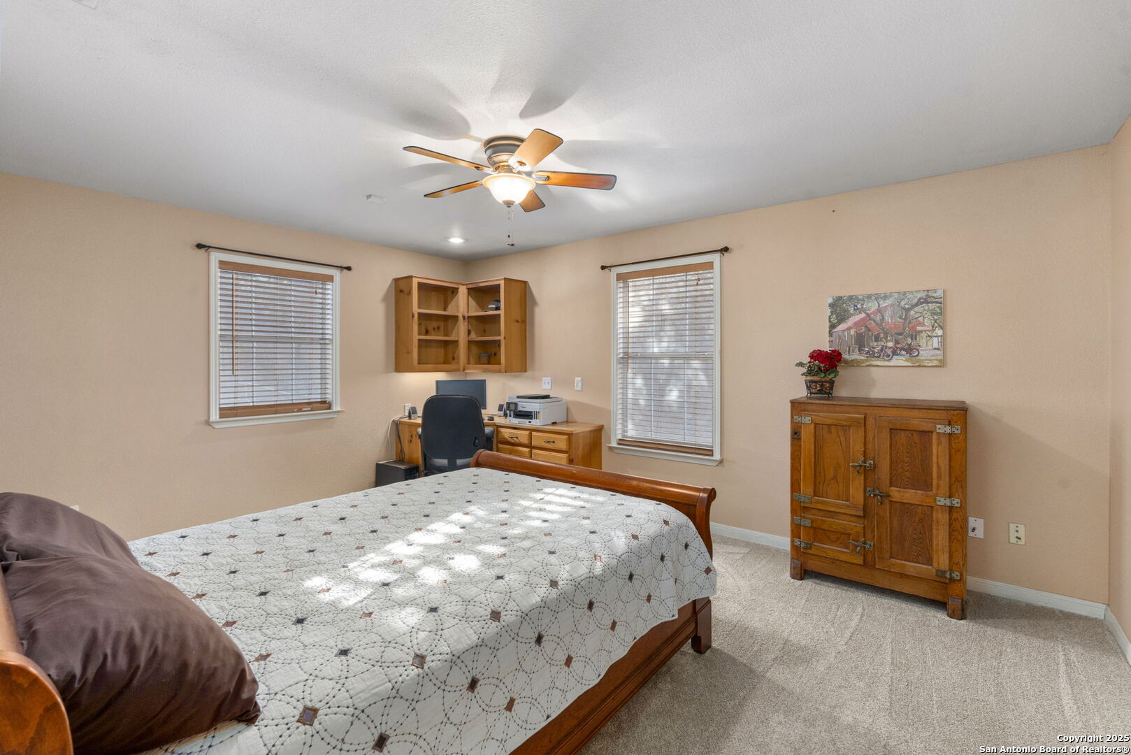 4335 Mail Rte Road Fischer, TX 78623 - Photo 28 of 50 a bedroom with a bed and a chandelier