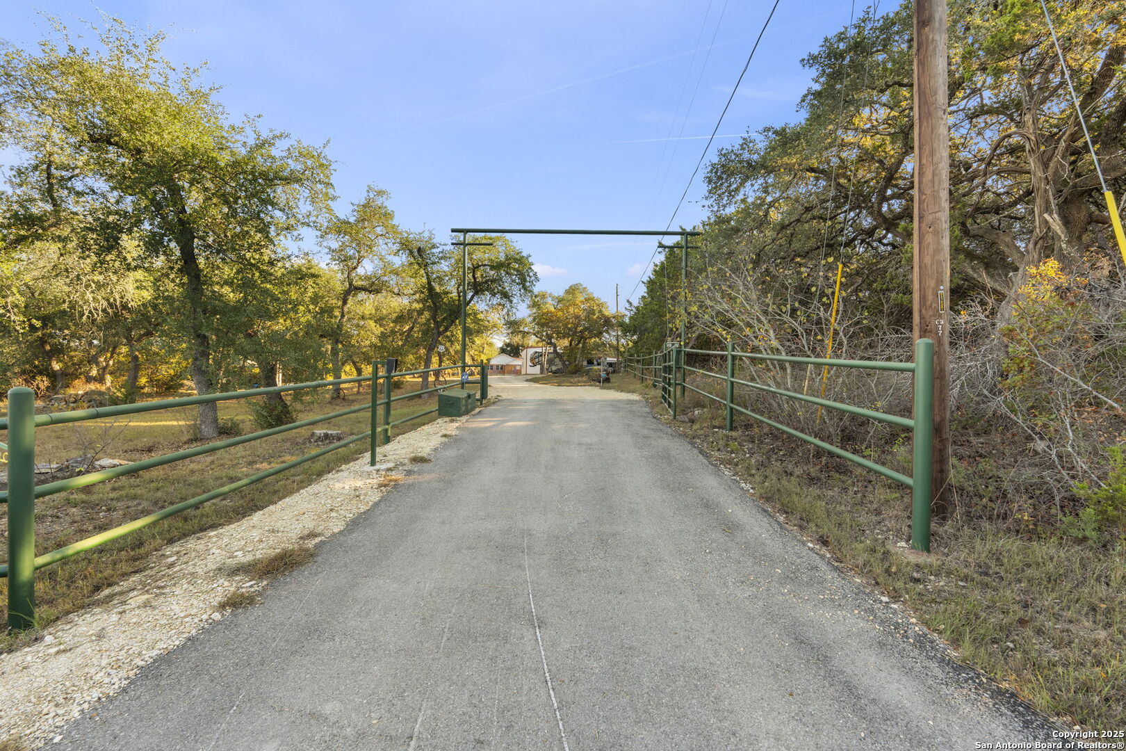4335 Mail Rte Road Fischer, TX 78623 - Photo 3 of 50 a view of a pathway with a wrought fence