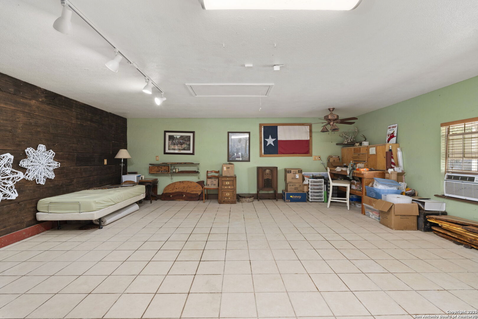 4335 Mail Rte Road Fischer, TX 78623 - Photo 31 of 50 a living room with furniture and a flat screen tv