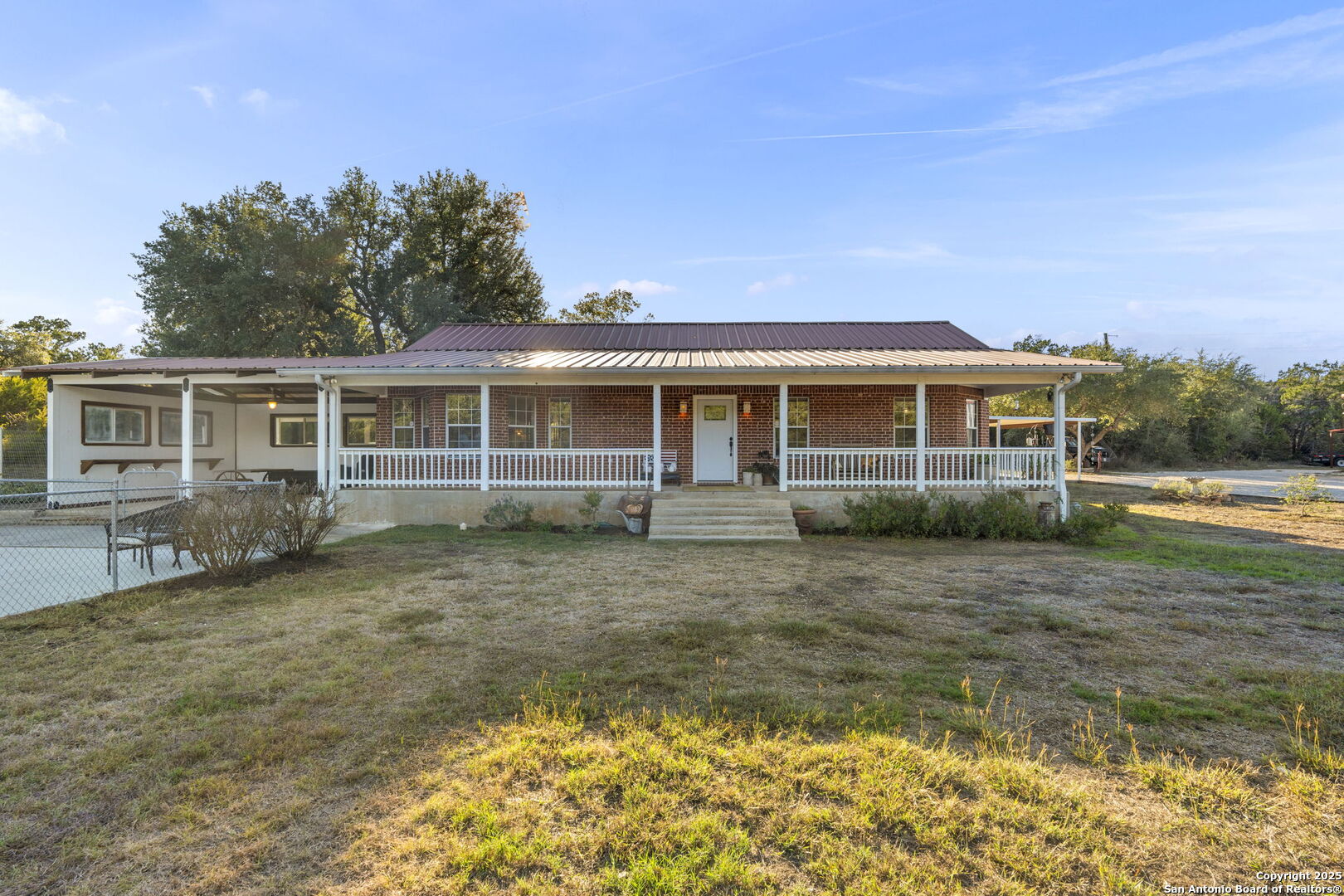 4335 Mail Rte Road Fischer, TX 78623 - Photo 36 of 50 a view of a house with a yard