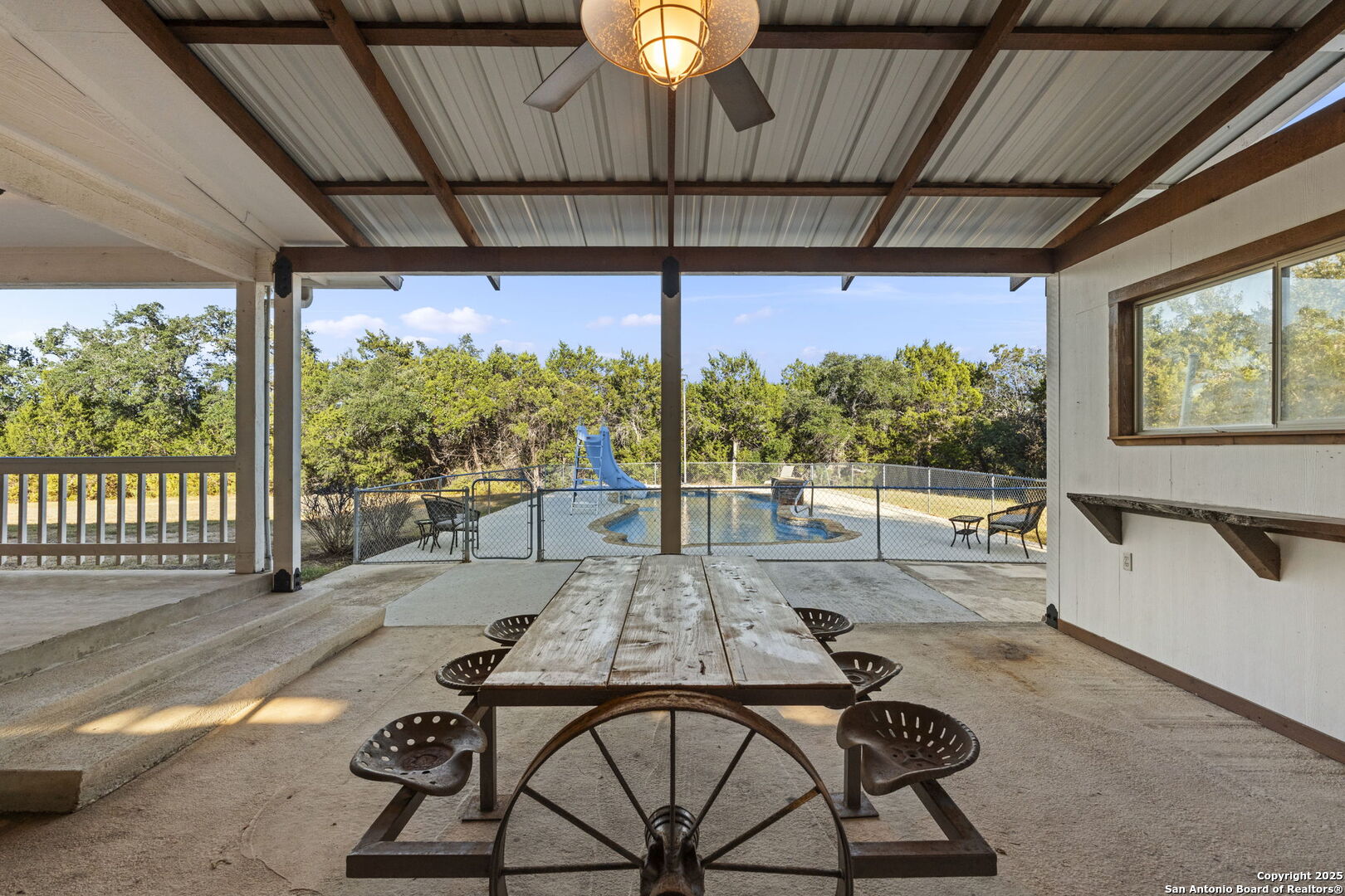 4335 Mail Rte Road Fischer, TX 78623 - Photo 38 of 50 a living room with large windows