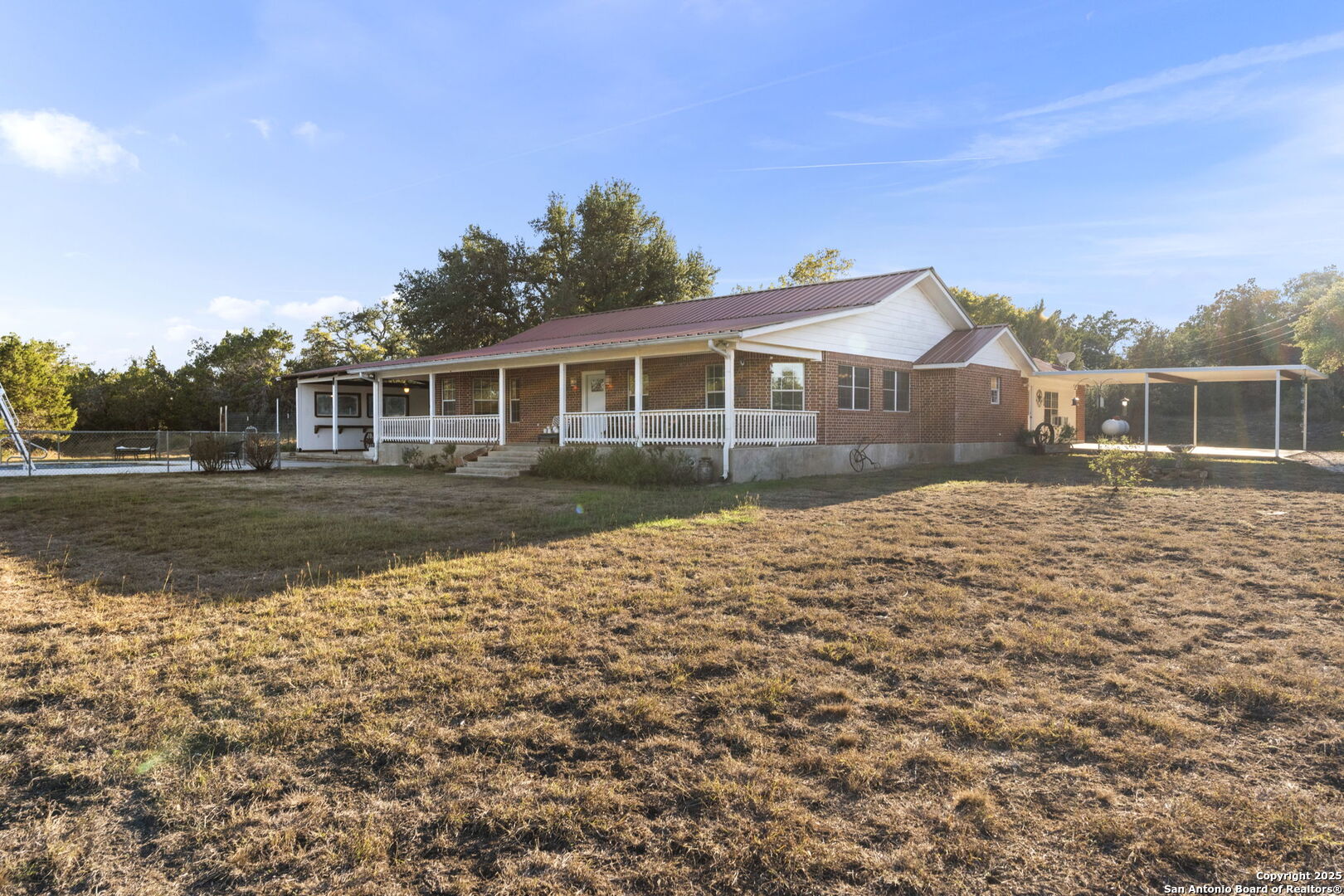 4335 Mail Rte Road Fischer, TX 78623 - Photo 4 of 50 a front view of a house with a yard