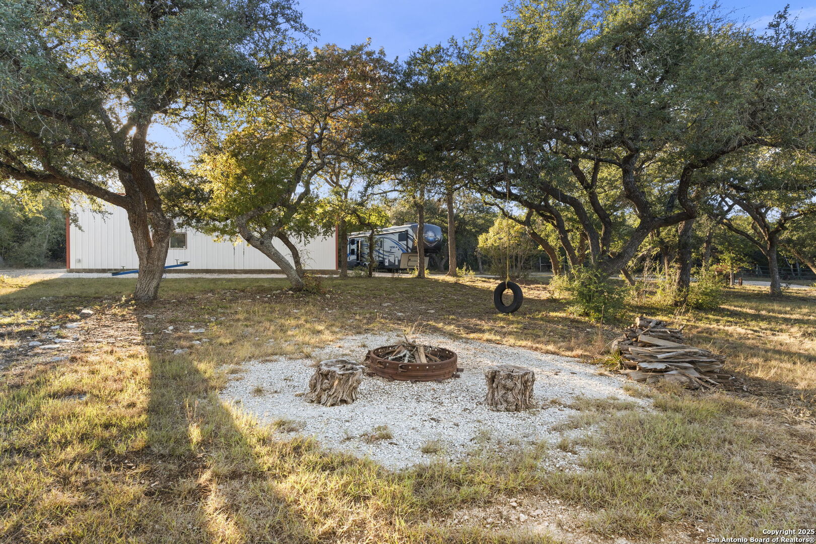 4335 Mail Rte Road Fischer, TX 78623 - Photo 45 of 50 a ground with trees in the background