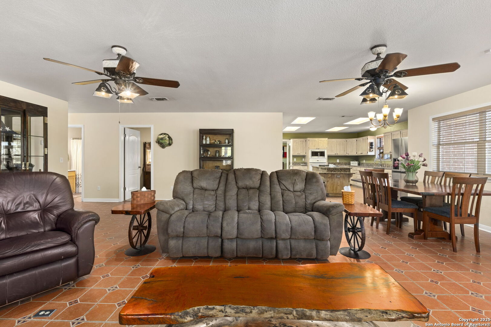 4335 Mail Rte Road Fischer, TX 78623 - Photo 9 of 50 a living room with furniture kitchen view and a chandelier