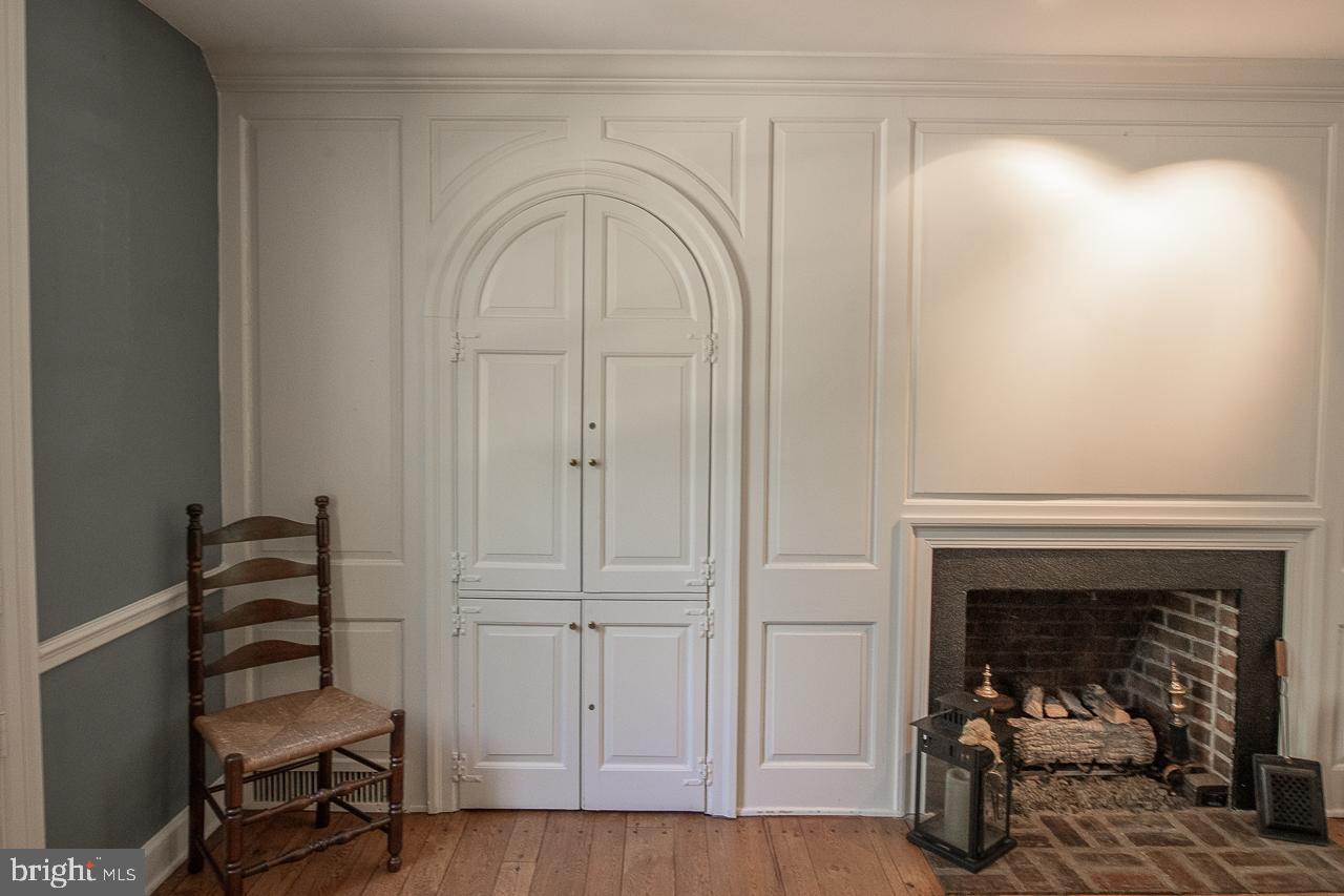 20 Righters Mill Road Gladwyne, PA 19035 - Photo 13 of 48 Arched Cabinetry and Fireplace
