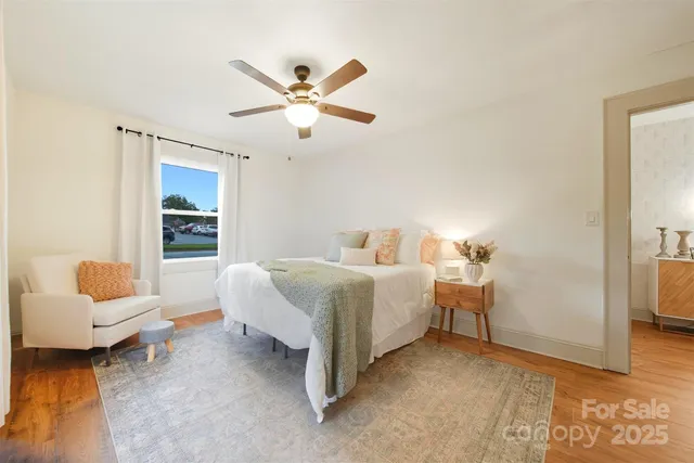 a bedroom with a bed and couch