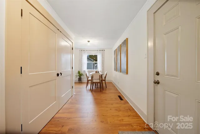 a very nice looking room with wooden floor
