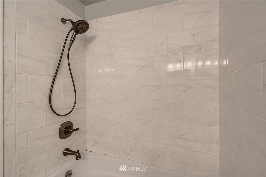706 221st Street Southwest Bothell, WA 98021 - Photo 17 of 27 a bathroom with a shower