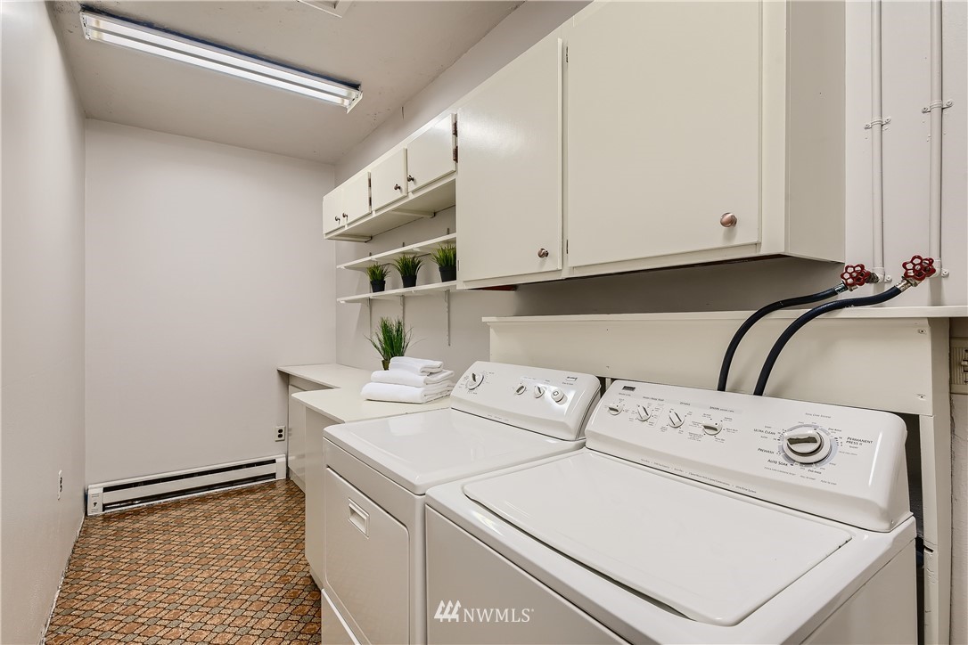 706 221st Street Southwest Bothell, WA 98021 - Photo 24 of 27 a utility room with dryer and washer