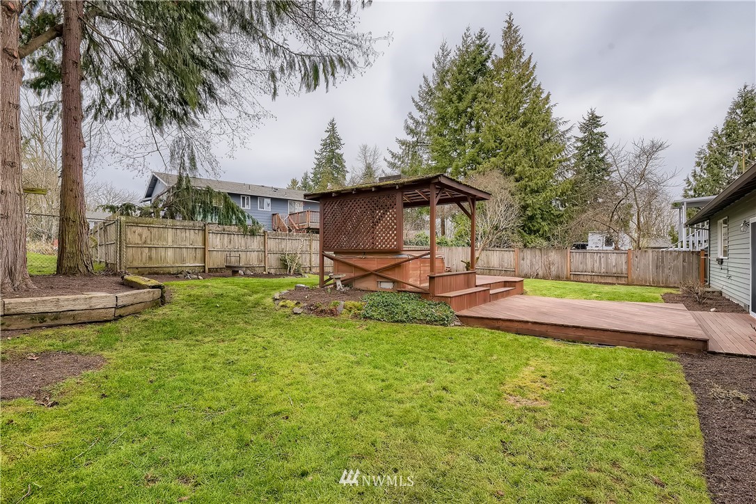 706 221st Street Southwest Bothell, WA 98021 - Photo 26 of 27 a view of a backyard with swimming pool