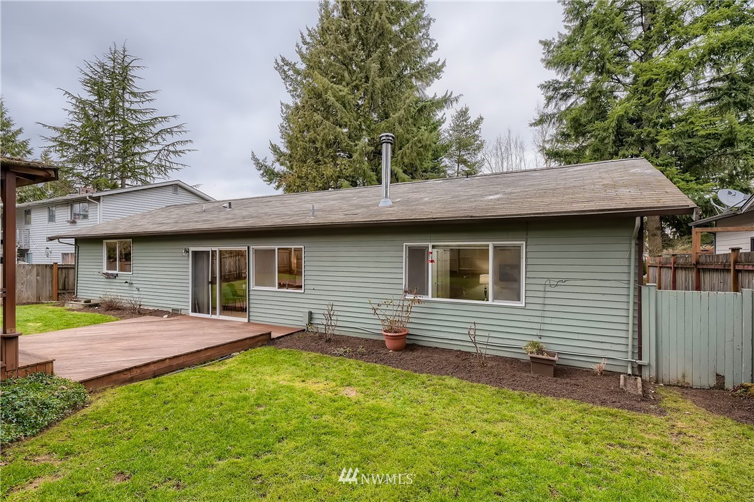 706 221st Street Southwest Bothell, WA 98021 - Photo 27 of 27 a front view of a house with a garden