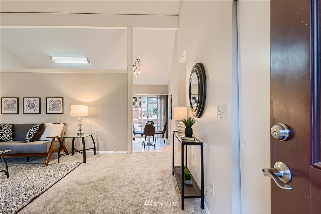706 221st Street Southwest Bothell, WA 98021 - Photo 6 of 27 a view of a livingroom with furniture and mirror