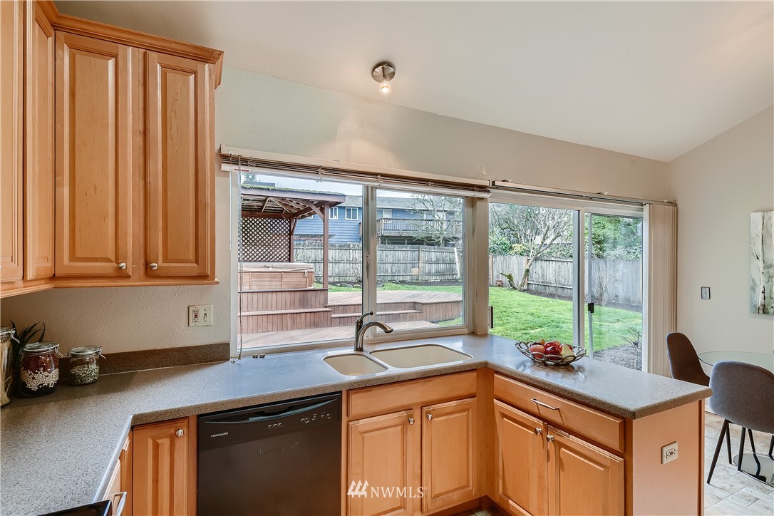 706 221st Street Southwest Bothell, WA 98021 - Photo 10 of 27 a kitchen with a sink and a window
