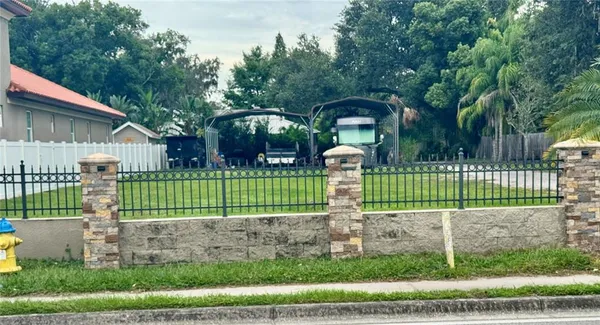 a front view of a house having garden