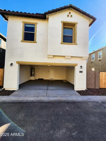 a view of a swimming pool with an outdoor seating and a garden