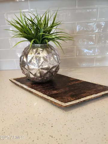 a vase of flowers sitting on a table