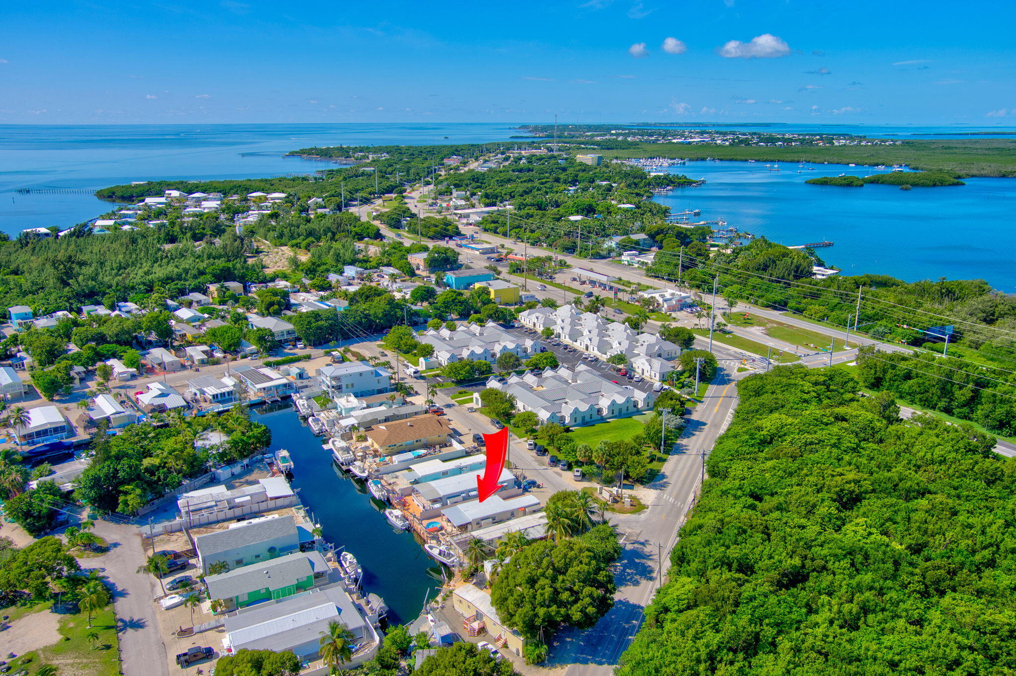 136 Sable Palm Lane Tavernier, FL 33070 - Photo 2 of 39 a view of a city and ocean view