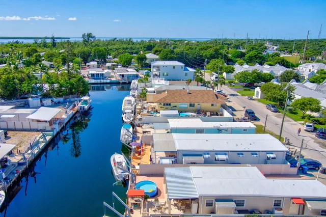 an aerial view of a house with a garden and outdoor space