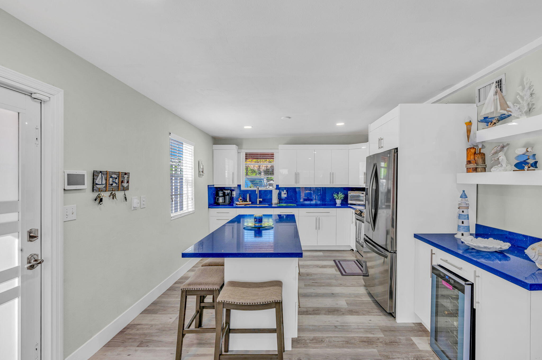 136 Sable Palm Lane Tavernier, FL 33070 - Photo 5 of 39 a room with furniture a refrigerator and a table