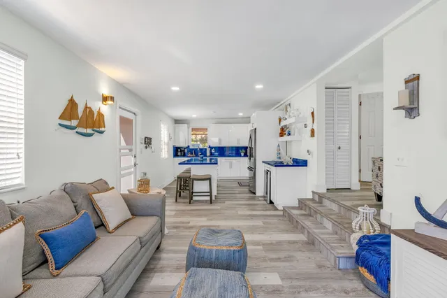 a living room with furniture and a table