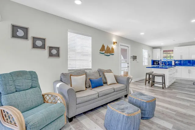 a living room with furniture and a couch