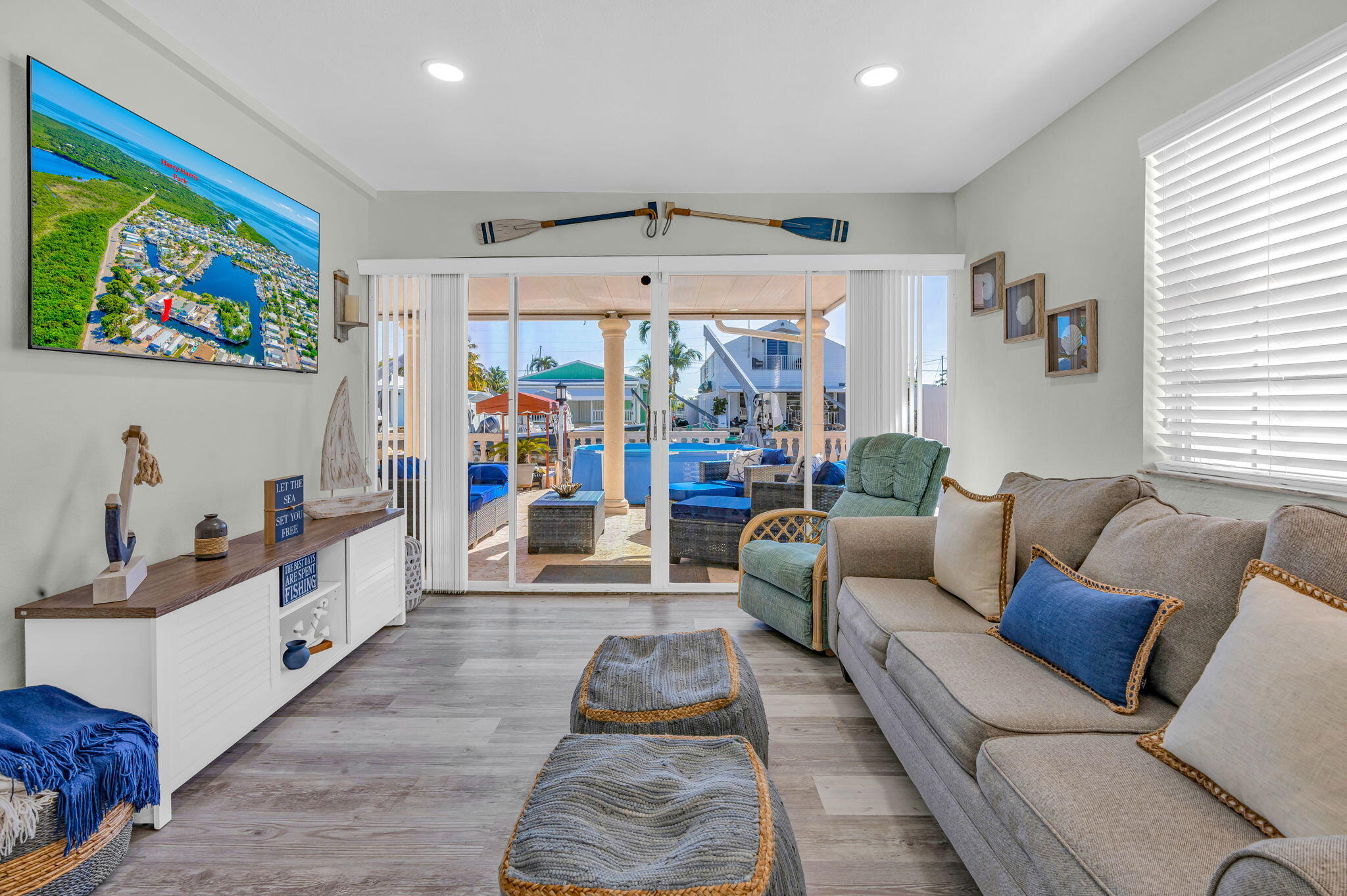 136 Sable Palm Lane Tavernier, FL 33070 - Photo 8 of 39 a living room with furniture and a flat screen tv