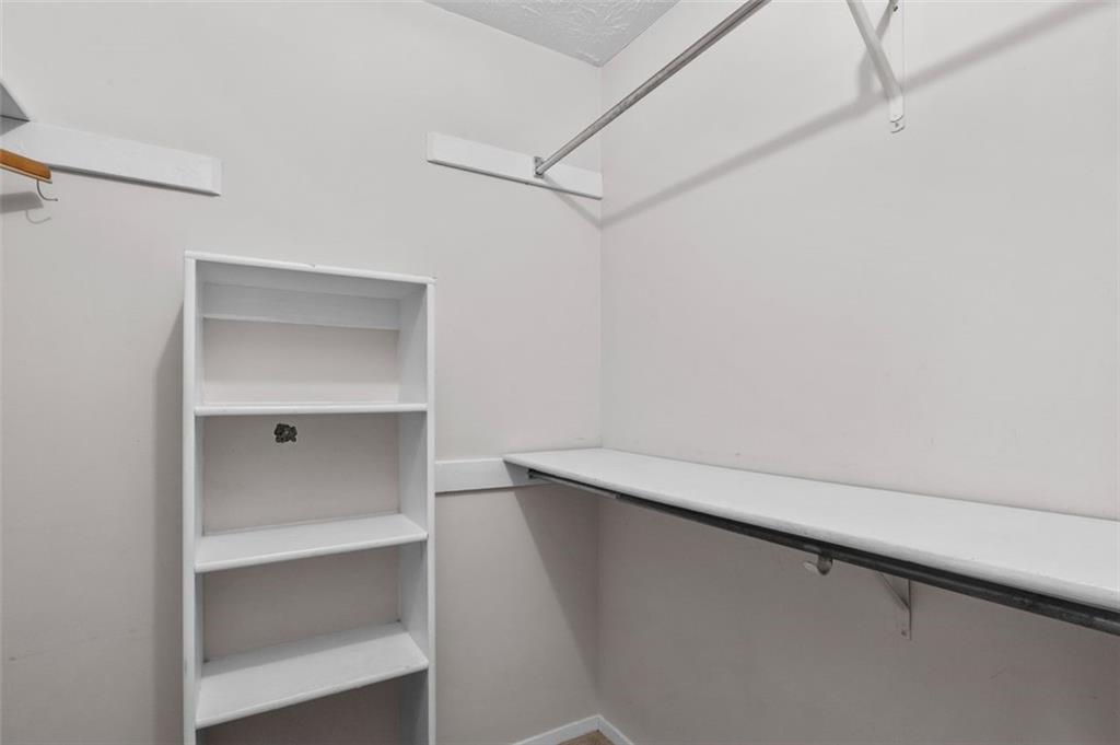 1004 Dunbar Drive Atlanta, GA 30338 - Photo 22 of 23 a view of an empty walk in closet