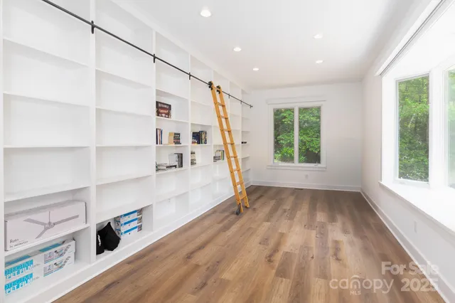 a view of livingroom with furniture and window