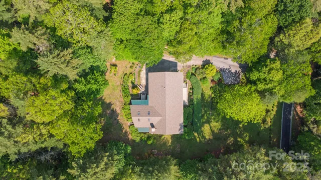 a house view with a garden space