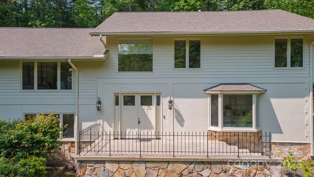 a front view of a house with a porch