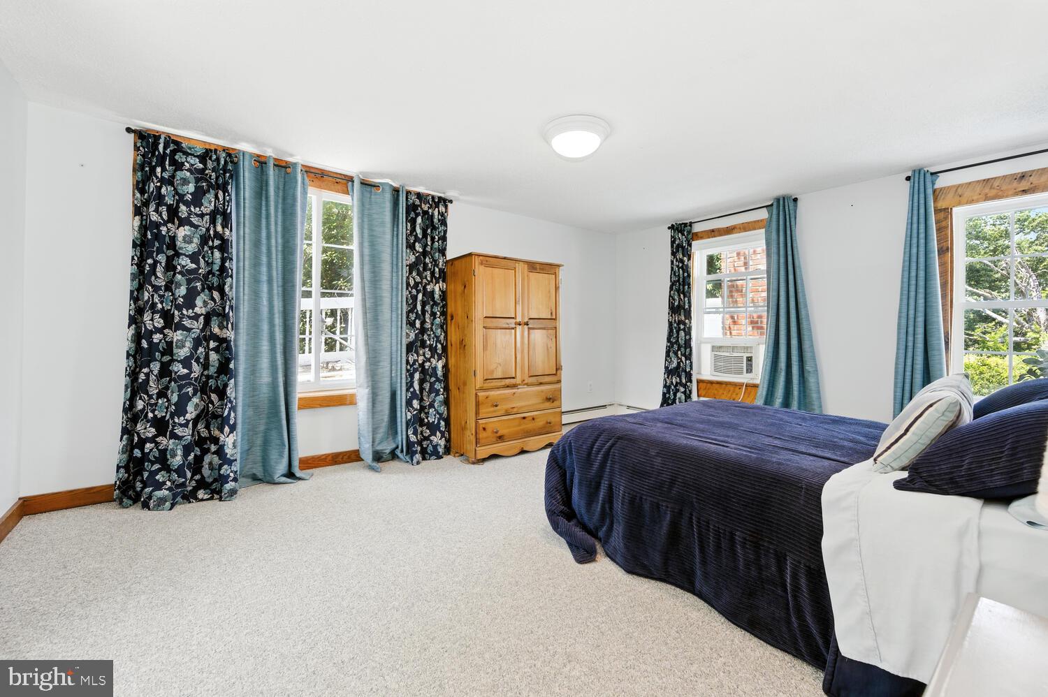 8000 Bozman Neavitt Road St. Michaels, MD 21663 - Photo 45 of 57 a bedroom with a bed and a window