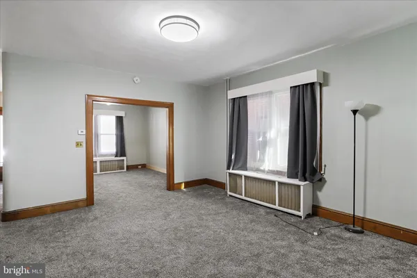 an empty room with windows