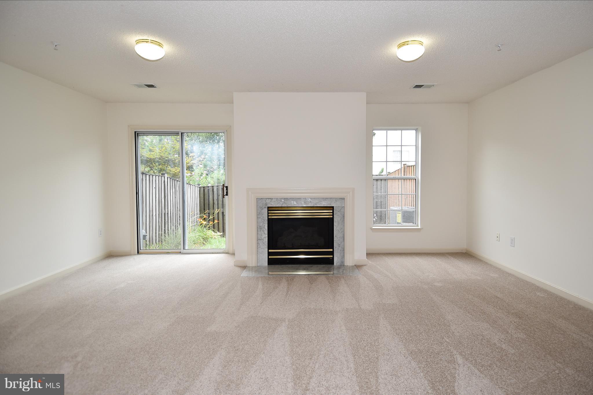 2346 Cold Meadow Way Silver Spring, MD 20906 - Photo 27 of 30 LOWER LEVEL FAMILY RM HAS SLIDER DOOR TO BACKYARD