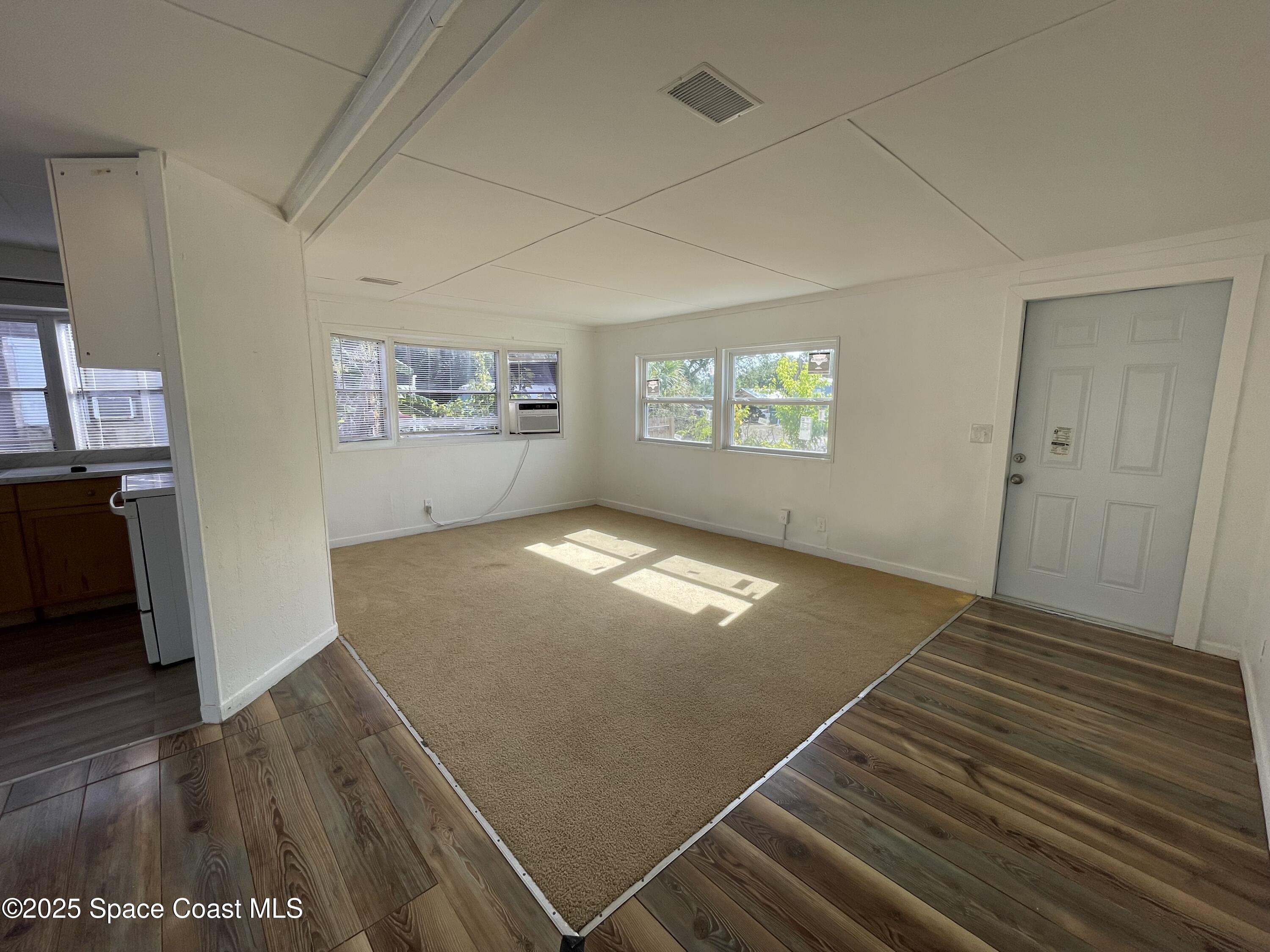 7002 Ash Drive Cocoa, FL 32927 - Photo 3 of 17 a view of livingroom with hardwood