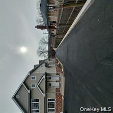 343 Jackson Street, Unit 5 Hempstead, NY 11550 - Photo 16 of 16 View of street featuring a residential view