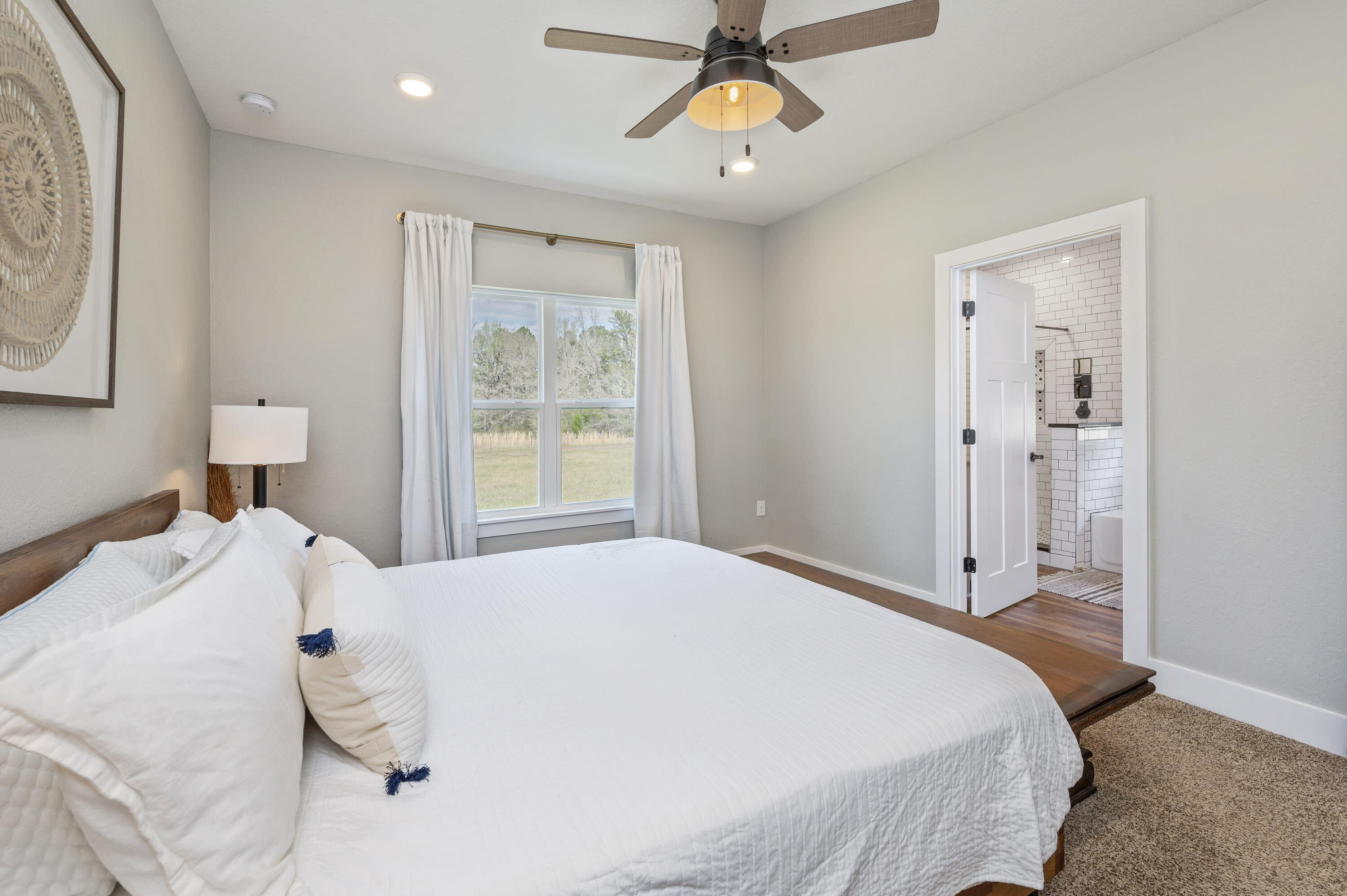 8151 Tommy Steele Road Baker, FL 32531 - Photo 11 of 36 a bedroom with a bed and a window
