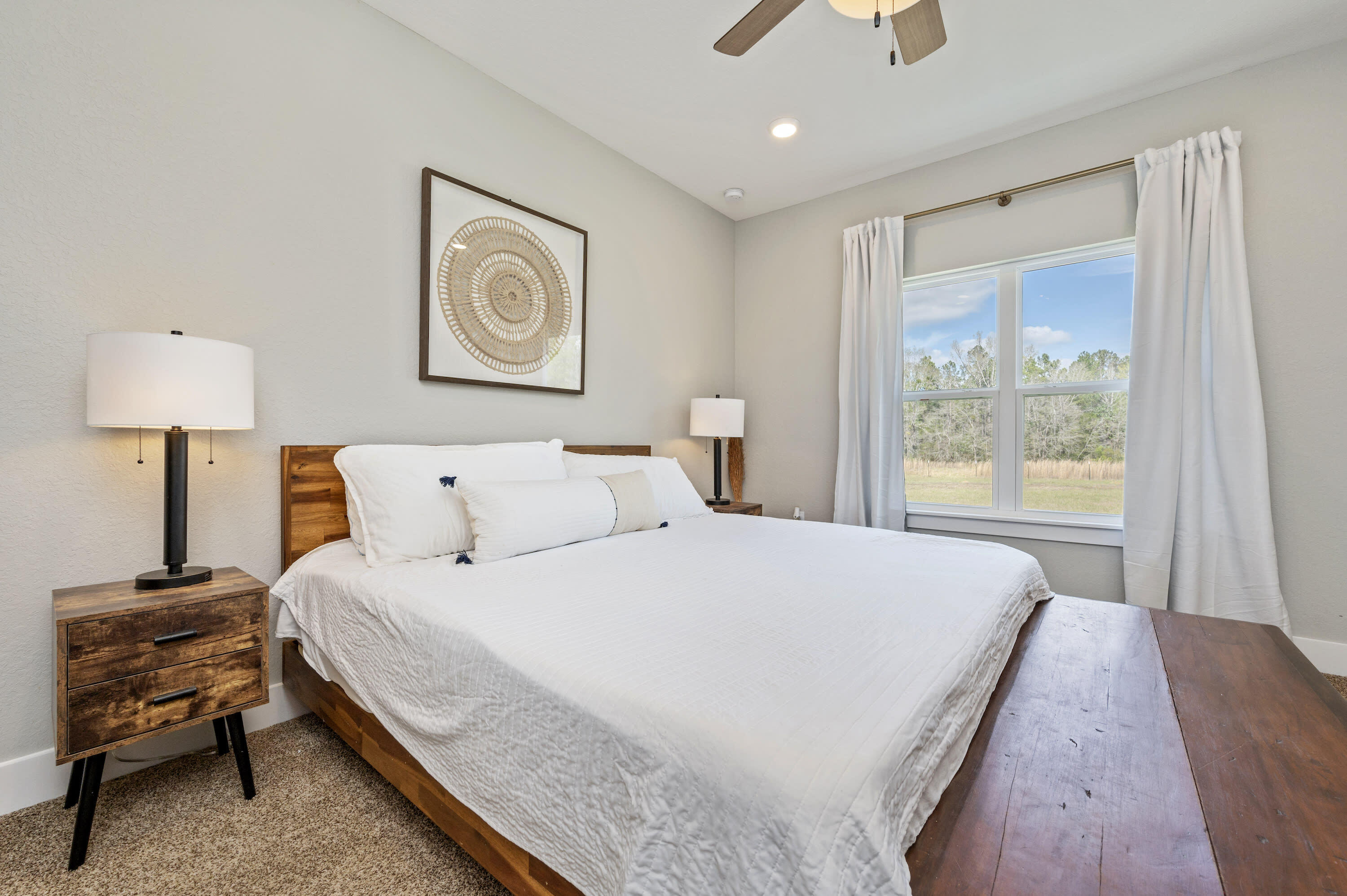 8151 Tommy Steele Road Baker, FL 32531 - Photo 12 of 36 a bedroom with bed and a window