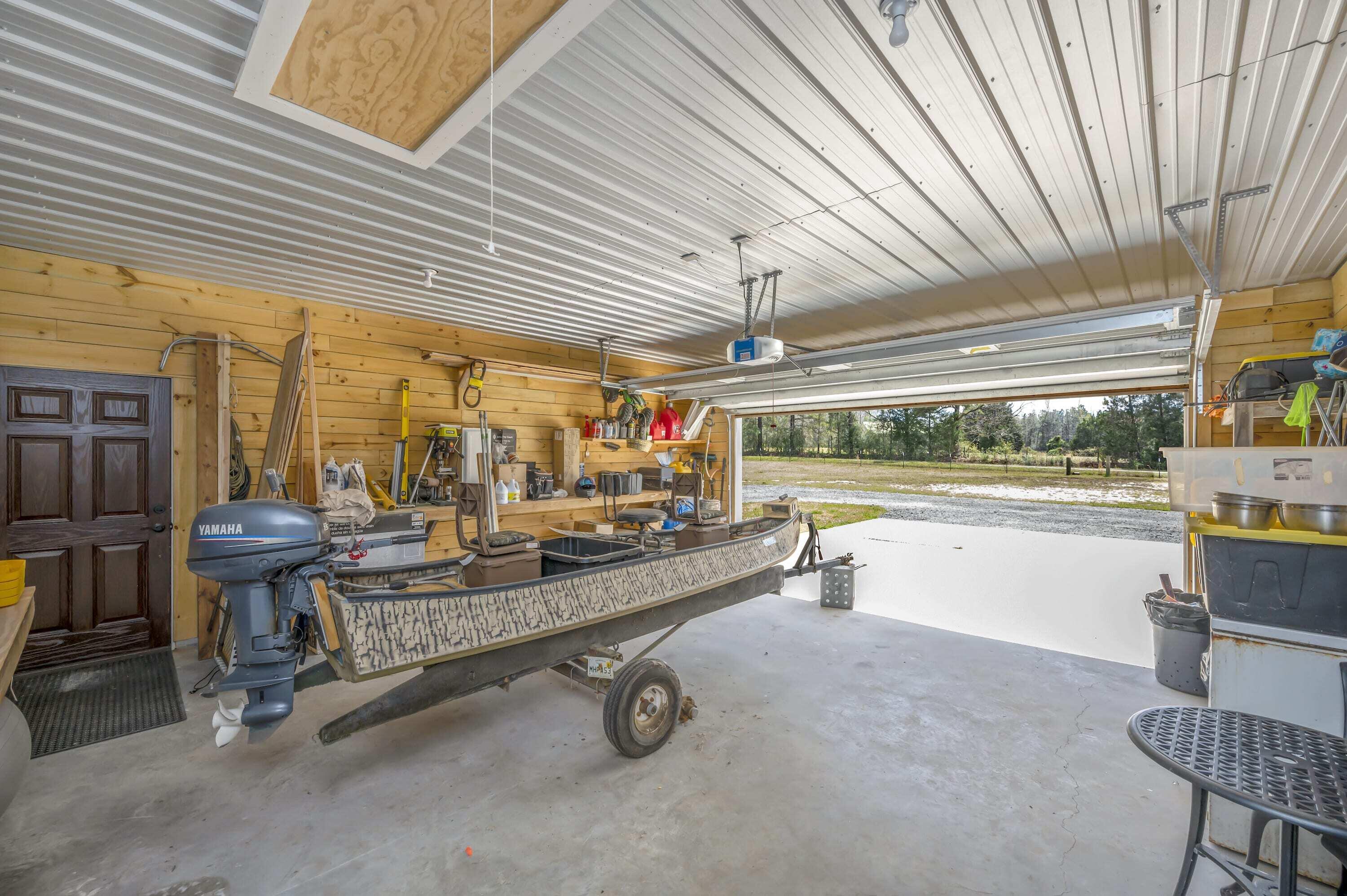 8151 Tommy Steele Road Baker, FL 32531 - Photo 18 of 36 a dining room with furniture and a table
