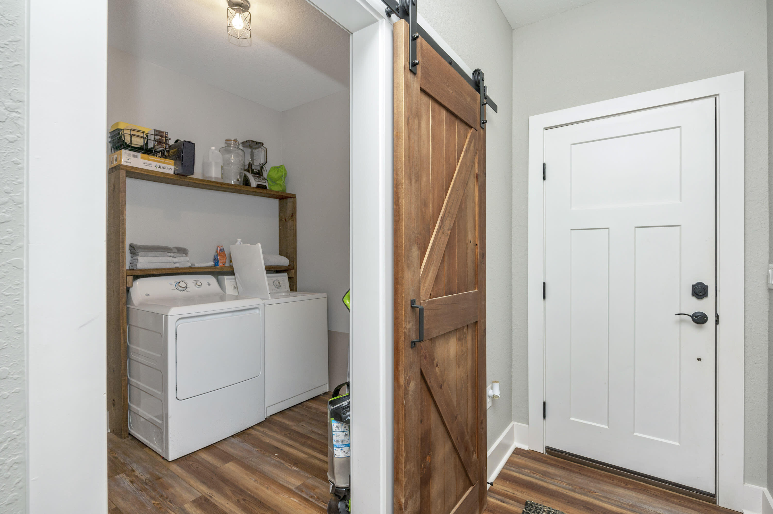 8151 Tommy Steele Road Baker, FL 32531 - Photo 19 of 36 a room with storage and utility