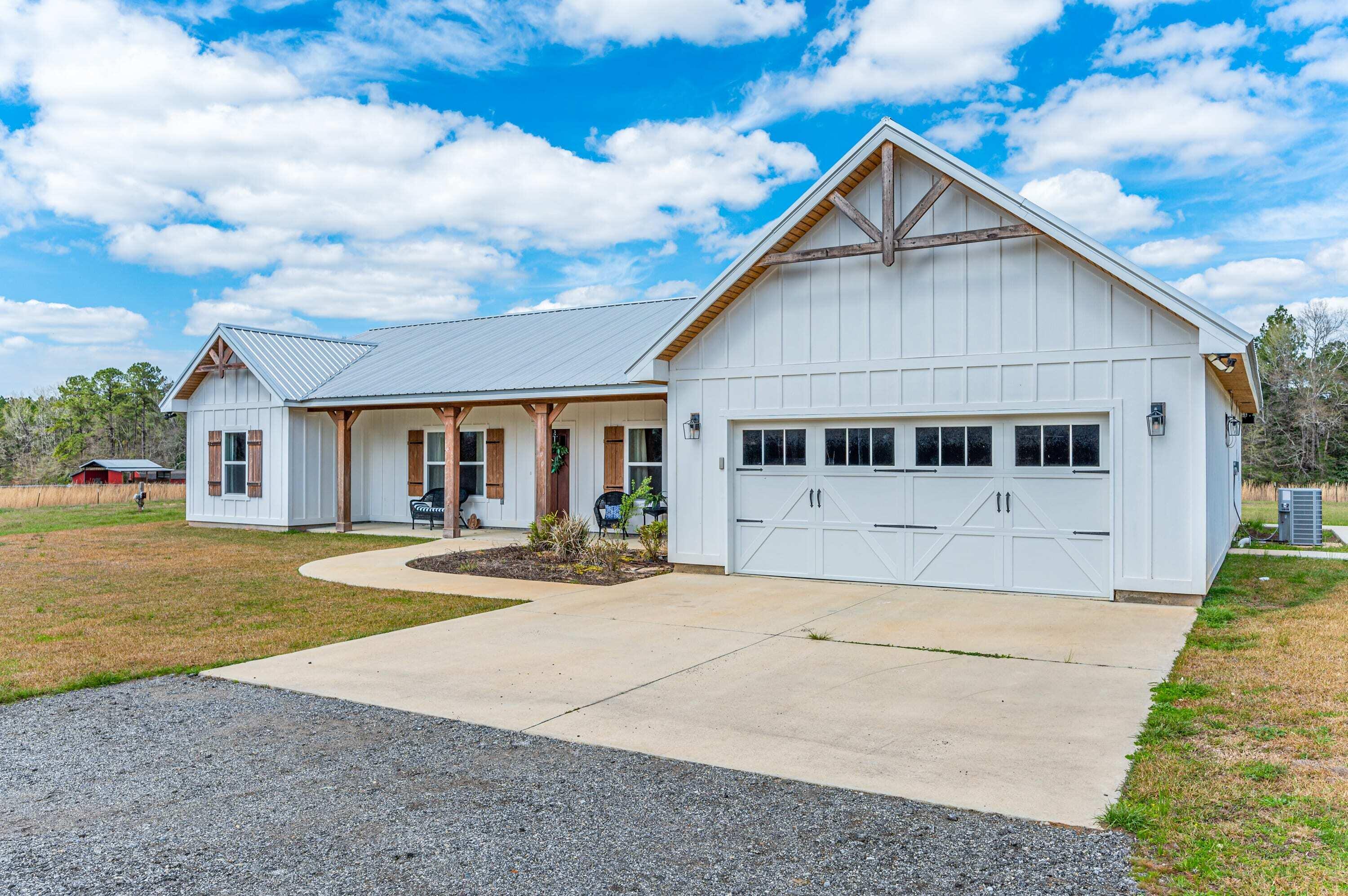 8151 Tommy Steele Road Baker, FL 32531 - Photo 3 of 36 front view of a house with a yard