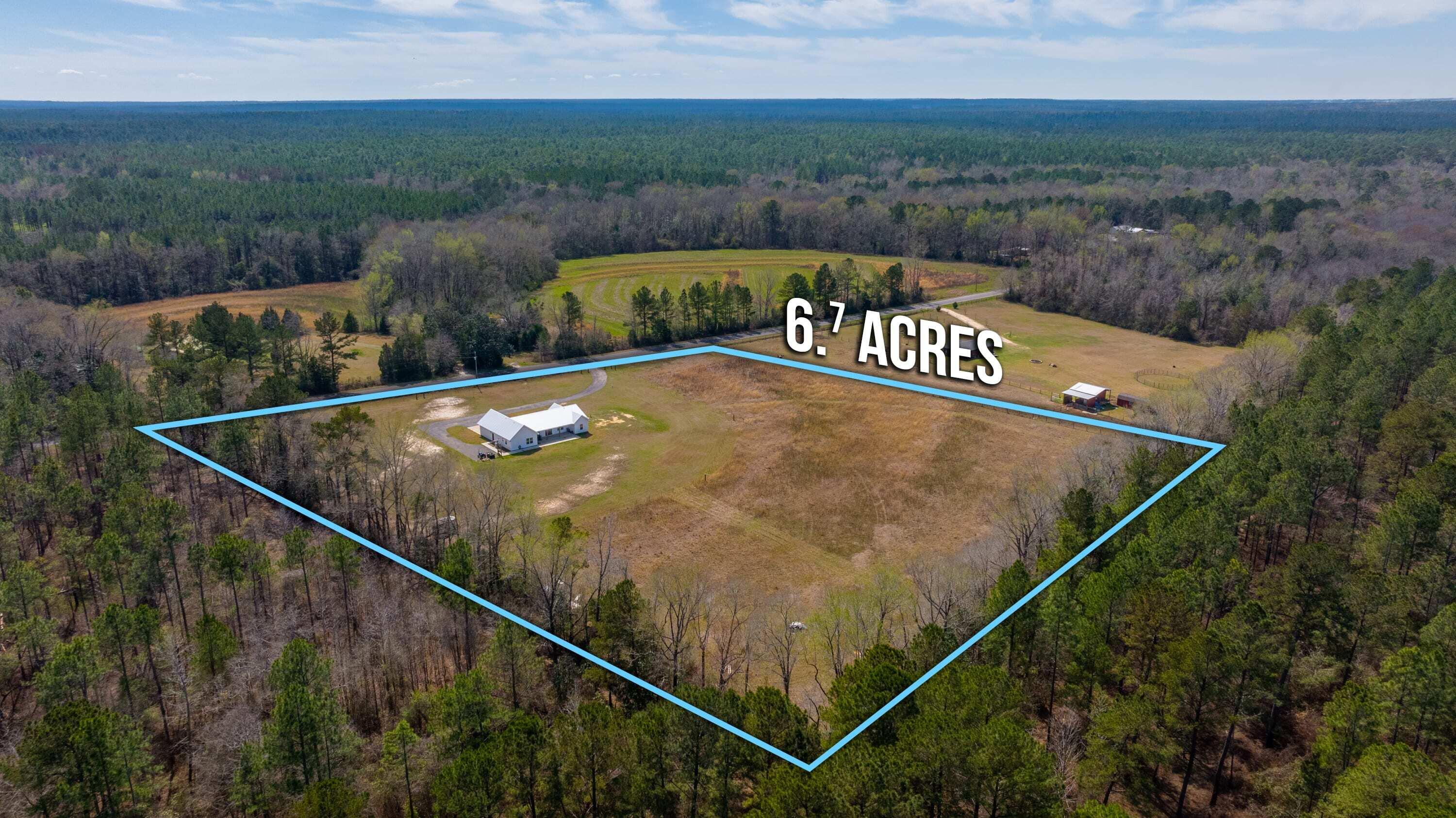 8151 Tommy Steele Road Baker, FL 32531 - Photo 33 of 36 a view of a back yard