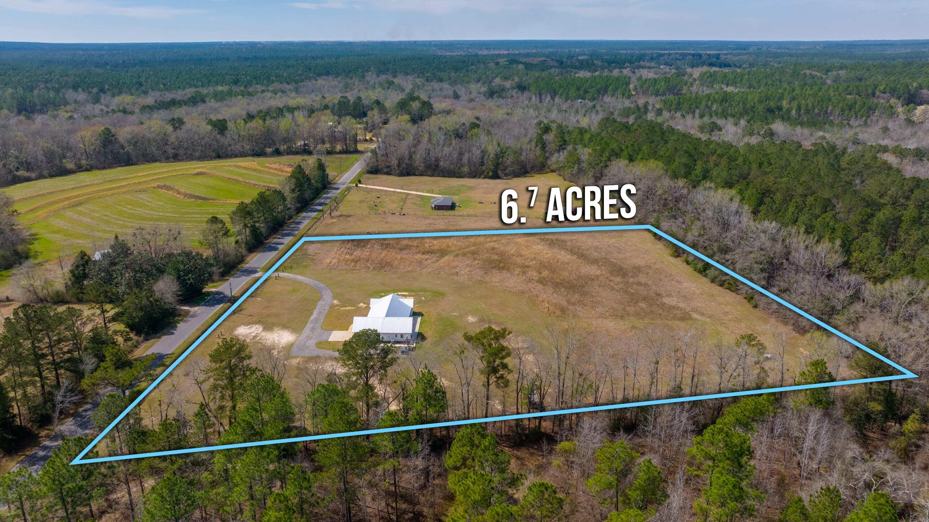 8151 Tommy Steele Road Baker, FL 32531 - Photo 34 of 36 a view of a swimming pool with a mountain view