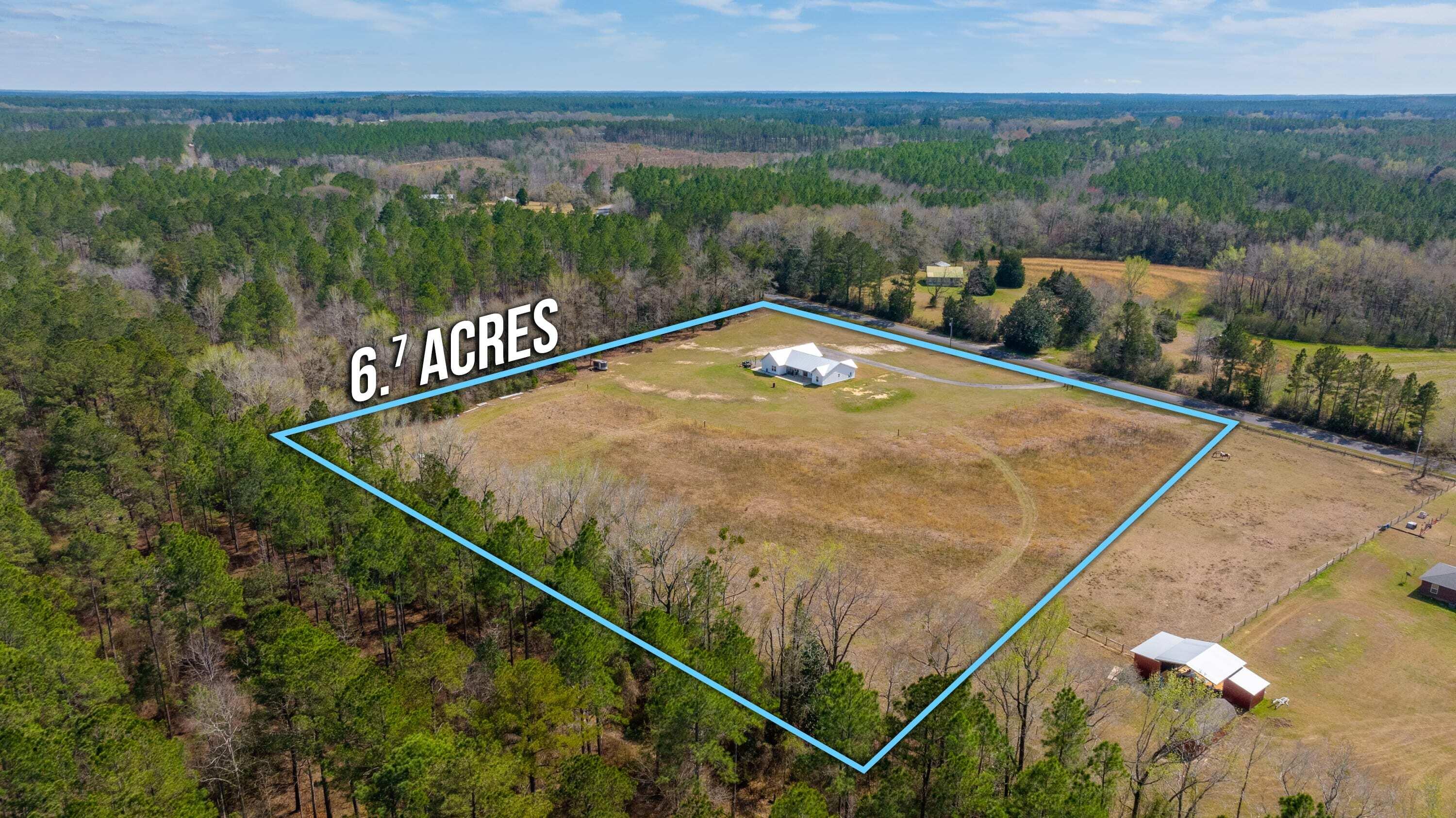 8151 Tommy Steele Road Baker, FL 32531 - Photo 35 of 36 a view of a tennis court